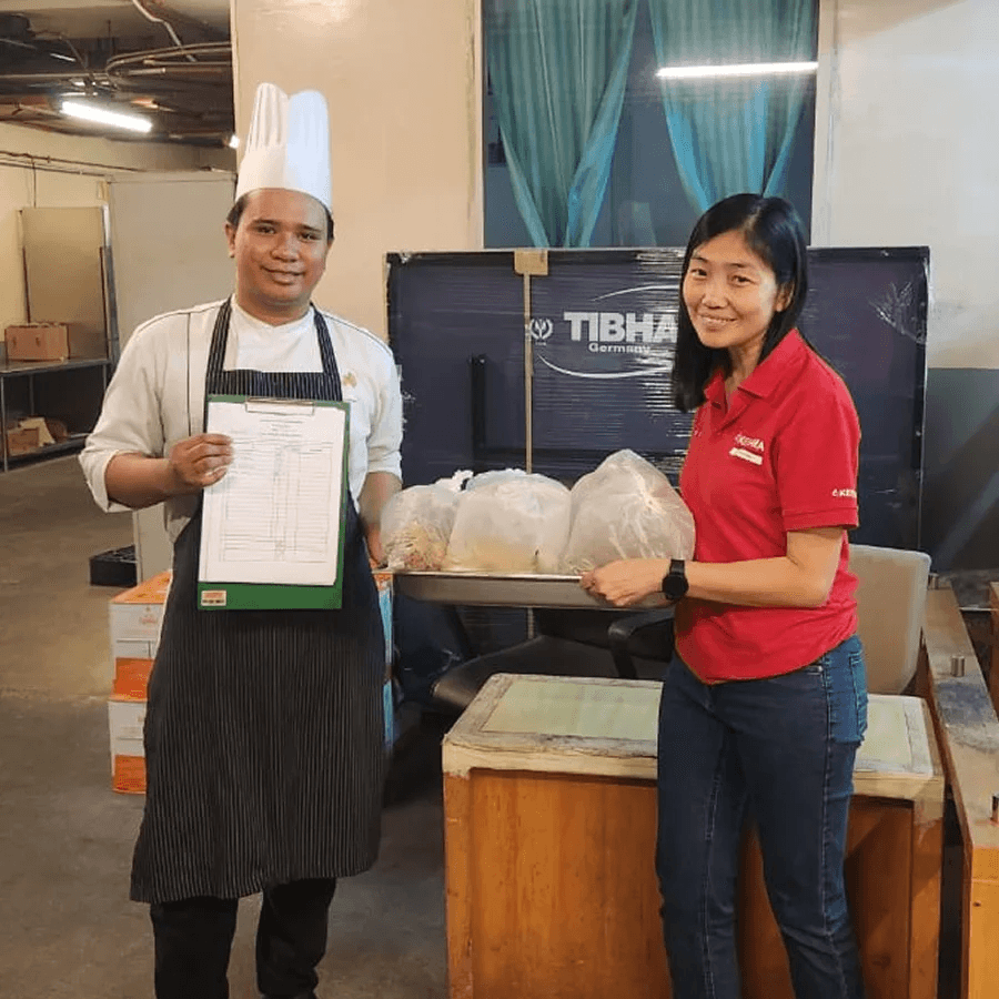 Volunteers collecting surplus food for distribution